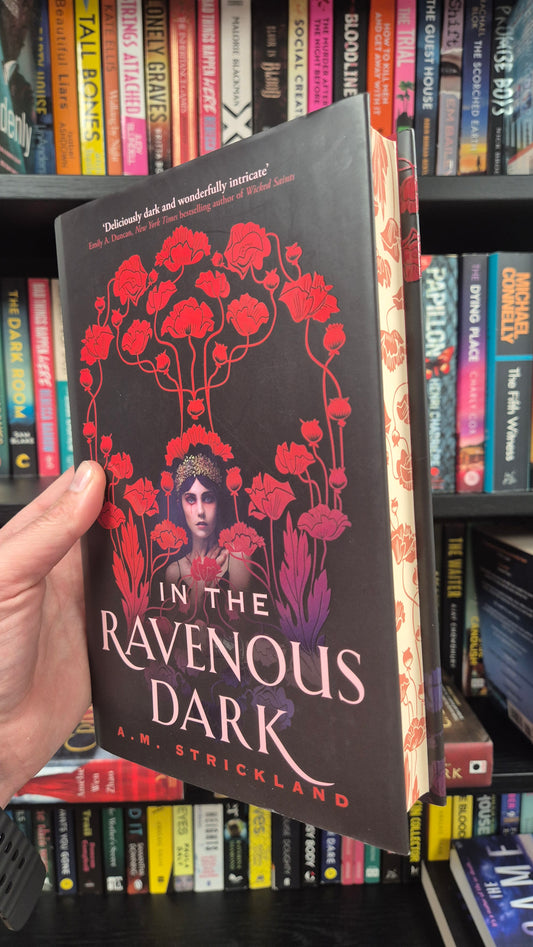 In The Ravenous Dark - A.M Strickland